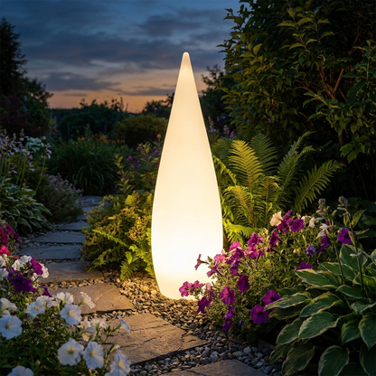 Auradrop Outdoor Glow solar light in garden at dusk lifestyle setting